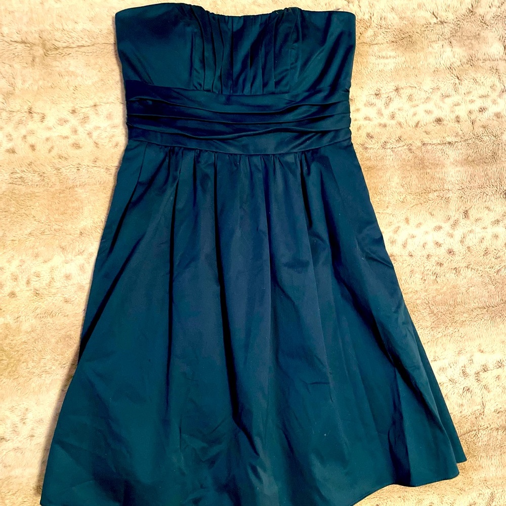 Strapless, knee-length teal party dress from David’s bridal.